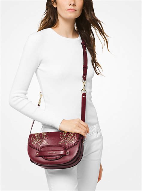 michael kors cary medium grommeted leather saddle bag|Michael Kors extra small crossbody.